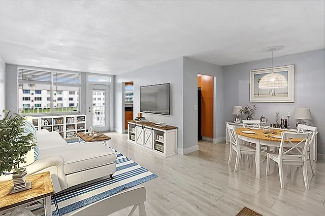 Bright living and dining room in a North Palm Beach waterfront condo